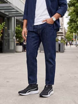Skyrocket Lite 2 – Refined Casual: Slim-fit dark indigo jeans with a white pima cotton t-shirt and an unbuttoned navy linen shirt for a clean, effortless weekend aesthetic.