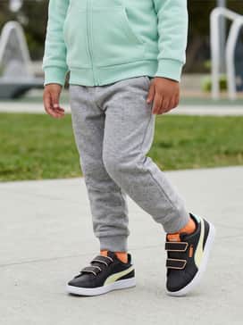 Tapered grey joggers matched with a coordinate mint green zip-up hoodie for a cozy and athletic look perfect for playdates.