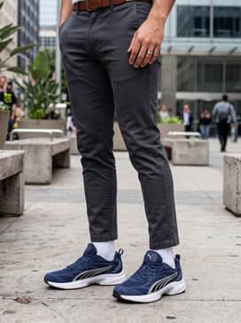 Softride Escalate Mens Sneakers – A sleek casual weekend look consisting of slim-fit dark wash jeans, a crisp white crew-neck t-shirt, and a navy bomber jacket.