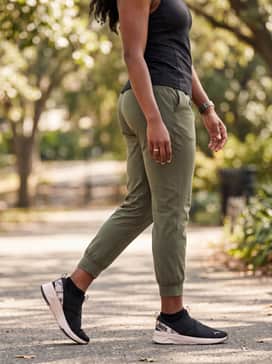 Softride Harli Floral Womens Slipon Sneakers – Wear with olive green joggers and a slim-fit black long-sleeve performance top for a functional yet stylish outfit suitable for a park walk or travel.