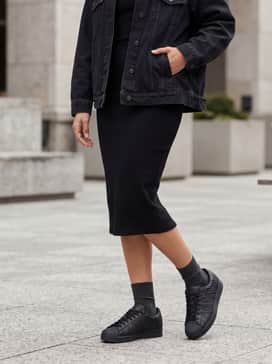 Pair with a black midi-length bodycon dress and an oversized denim jacket for an effortless weekend brunch outfit that balances comfort and style.