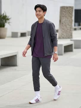 Taekwondo Lace Shoes Kids – A sporty ensemble featuring charcoal joggers, a purple moisture-wicking t-shirt, and white crew socks to highlight the sneaker's stripes.