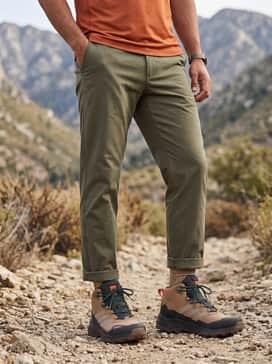 Terrex Skychaser Ax5 Mid Goretex Hiking Shoes – Summer Trek Outfit: Combine with olive quick-dry utility shorts, a technical performance tee in burnt orange to highlight the shoe's accents, and high-performance crew socks.