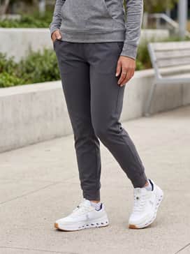 Combine with grey tapered joggers, a matching performance hoodie, and a sleek baseball cap for a high-end athleisure aesthetic.