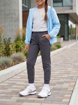 For a school-day athletic vibe, pair these with tapered charcoal grey joggers, a white graphic T-shirt, and a lightweight zip-up windbreaker.