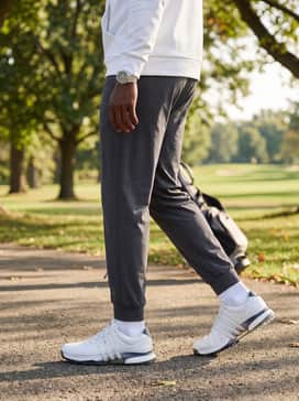 Tour360 25 Spikeless Golf Shoes – Wear with charcoal performance joggers and a breathable white hoodie for an athletic, comfortable ensemble during practice sessions.