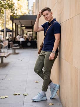 Ua Aura Ripstop – Tapered olive green chinos combined with a crisp navy blue polo shirt and a sleek minimalist watch for a smart-casual weekend brunch ensemble.