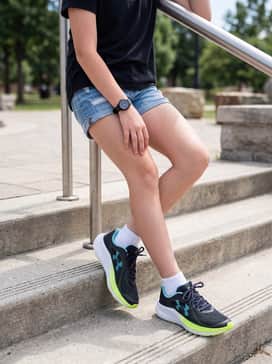 Light wash denim shorts and a simple black graphic t-shirt for a versatile and comfortable everyday school outfit.