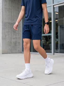 Ua Charged Turbulence 3 – Pair these white sneakers with navy blue moisture-wicking athletic shorts and a light grey technical t-shirt for a classic track-and-field look.