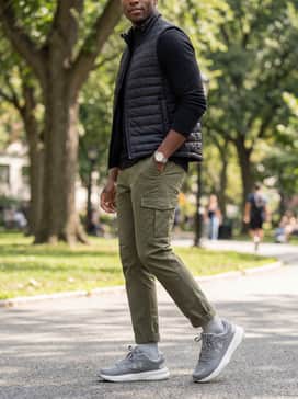 Ua Edge Leather – Match with olive cargo pants and a black quilted vest over a long-sleeve tee for a rugged, outdoor-inspired style.