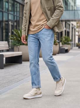 Combine with light wash straight-leg jeans, a tan heavyweight cotton t-shirt, and an open olive-drab utility jacket for a layered street look.