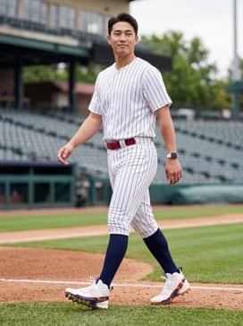 Ua Harper 10 Pro Tpu Le Usa – A crisp white pinstriped baseball uniform with navy blue stirrups and a matching crimson belt to highlight the cleat's secondary colors.