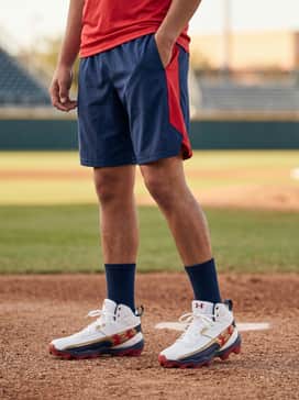 Practice ready: Coordinate with navy blue moisture-wicking athletic shorts and a red performance tech tee for afternoon training sessions.