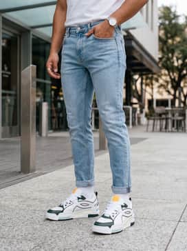 Ua Hblo – Style with light-wash slim-fit denim and a white cable-knit sweater for a fresh, clean aesthetic that highlights the sneaker's intricate paneling.