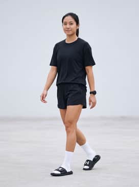 Ua Ignite Pro – Athletic performance shorts paired with a moisture-wicking compression shirt and white crew socks for a classic gym recovery look.