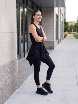 Ua Pursuit 4 – Dark-wash skinny jeans or cropped denim paired with a simple tucked-in tee and an oversized denim jacket for a sporty streetwear vibe.