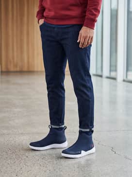 Ua Shoreman – Pair with dark indigo performance denim and a red crewneck sweatshirt to highlight the shoe's accent color for a casual day out.