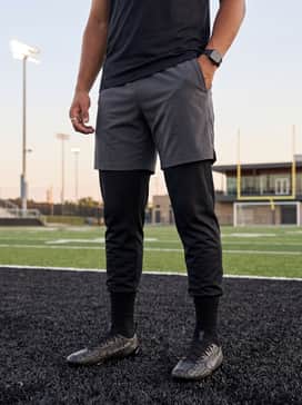 Ua Spotlight Pro Pth – A rigorous training ensemble consisting of lightweight four-way stretch athletic shorts, a sleeveless heat-gear compression top, and a breathable cooling skull cap.