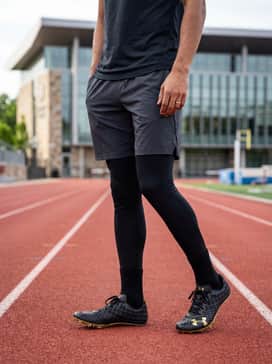 Ua Sprint Pro 3 – High-waist compression leggings paired with a fitted, moisture-wicking racerback tank for training sessions.
