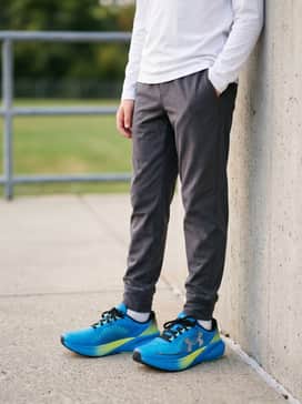 Ua Velociti Pace – School Ready: Combine with tapered charcoal grey joggers and a crisp white long-sleeve tee to create a clean, sporty everyday aesthetic.