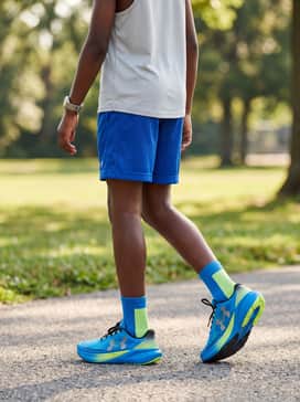 Summer Active: Wear with breathable royal blue mesh shorts and a light grey tank top to stay cool and fast during playground activities.
