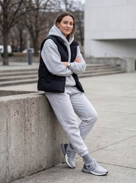 Ultraboost 10 Atr Shoes – Grey fleece joggers combined with a matching oversized hoodie and a matte black puffer vest to create a cozy, monochromatic streetwear aesthetic.