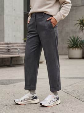 Ultraboost 5 Shoes – Cropped light-wash straight-leg jeans paired with a tucked-in oversized grey graphic t-shirt and a structured black blazer for a high-low street ensemble.