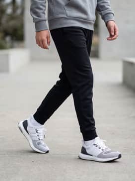 Athletic performance look: Pair with black moisture-wicking joggers, a matching grey athletic hoodie, and white performance socks for a sleek, gym-ready ensemble.