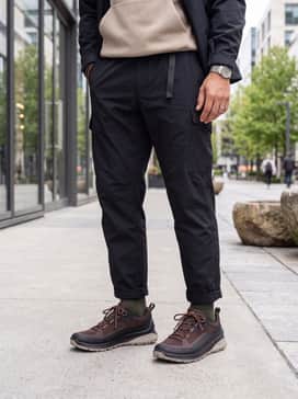 Ulttrn – Gorpcore Aesthetic: Pair with wide-leg black technical trousers, a beige oversized hoodie, and a structured utility vest for a functional urban look that leans into outdoor trends.
