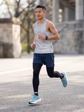 Pair these sneakers with black high-compression running tights, navy blue moisture-wicking shorts, and a silver reflective performance tank for a streamlined professional runner look.