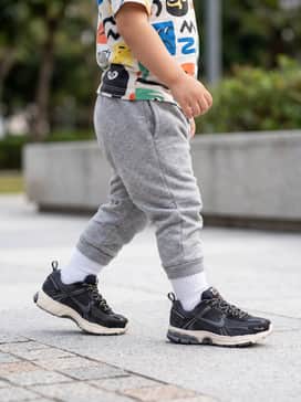 Soft grey cotton joggers and a vibrant graphic t-shirt to highlight the colorful laces.