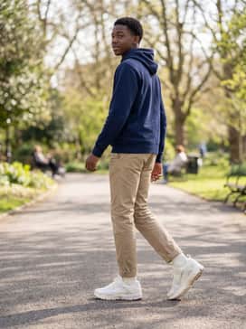 Wear with khaki chinos and a navy blue hoodie for a clean, put-together outfit suitable for school or weekend activities.