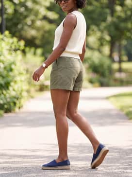 Womens Cloudfeel Espadrille Ii Slipon Loafers – Olive green utility shorts paired with a cream-colored sleeveless knit top and oversized tortoiseshell sunglasses for a relaxed outdoor adventure.
