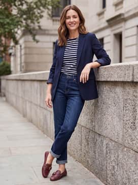 Womens Grand Ambition Alette Buckle Loafers – High-waisted straight-leg denim in a dark wash, worn with a tucked-in striped Breton top and a navy blazer for a preppy, classic look.