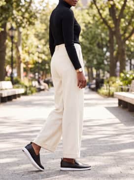 Womens Grand Ambition Galena Loafers – Minimalist Professional: Style with high-waisted wide-leg cream trousers and a black ribbed turtleneck to lean into a high-contrast, clean-lined ensemble that highlights the shoe's sleek design.