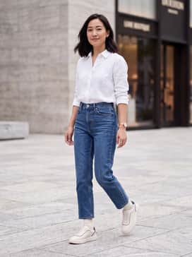 Pair with high-waisted cropped straight-leg denim and a tucked-in white linen shirt for a timeless casual look.