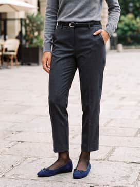 Womens Nicolette Ballet Flats – A grey cashmere turtleneck sweater tucked into a charcoal pencil skirt with sheer black tights for a sophisticated office ensemble.