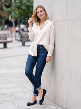 Womens Nicolette Ballet Flats – Dark wash skinny jeans worn with an oversized cream silk button-down shirt and delicate gold jewelry for a relaxed yet polished weekend outfit.
